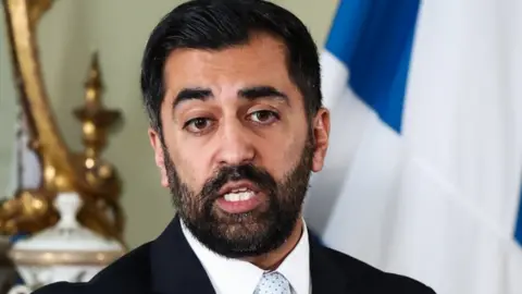 PA Media First Minister Humza Yousaf speaks during a press conference at Bute House in Edinburgh