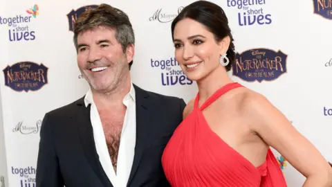 Getty Images Simon Cowell and Lauren Silverman