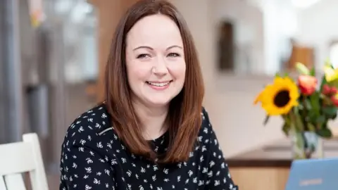 Liz in her kitchen