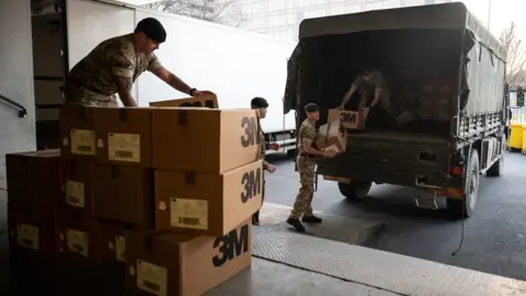 Getty Images Members of 101 Logistic Brigade have delivered medical masks to St Thomas' hospital in London