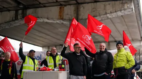 Striking bus workers