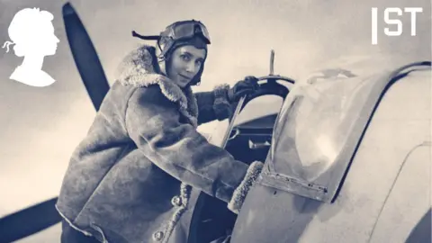 Royal Mail/ PA Media  Female pilot climbing into cockpit of a spitfire