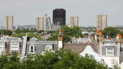 AFP The burned shell of Grenfell Tower block on the London skyline