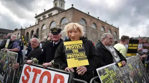 Getty Images Protestors when Boris Johnson last visited Northern Ireland