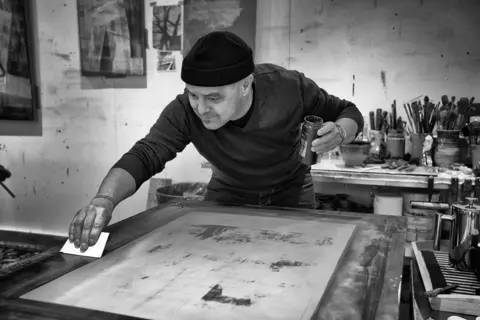 John Brockliss Preparing silk-screen masks: Laughton studio