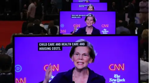 Getty Images Elizabeth Warren on lots of screens