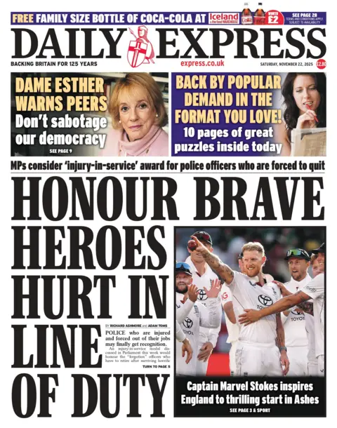 The headline on the front page of the Daily Express reads: "Honour brave heroes hurt in line of duty". 