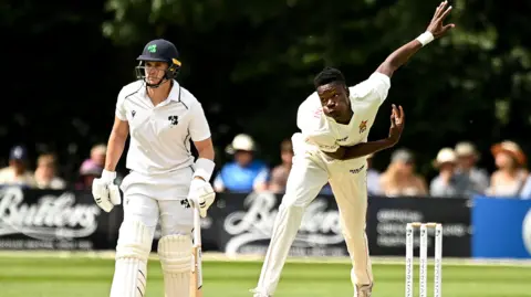 Zimbabwe's Blessing Muzarabani bowls against Ireland in 2024