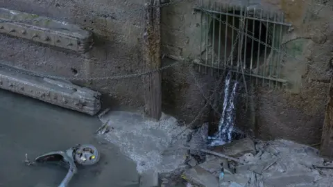 Sewage discharging into Thames