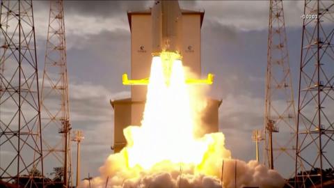 Column of fire after rocket sets off from launch pad