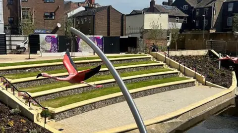 Luton Borough Council Flamingos in place in Hat Gardens, Luton