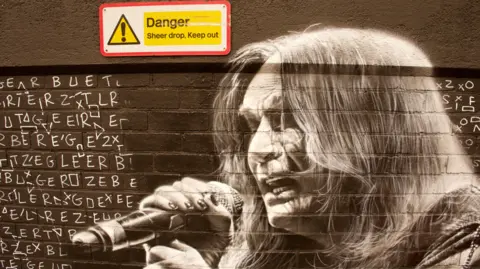 John Bray Mural showing a black and white image of Ozzy Osbourne