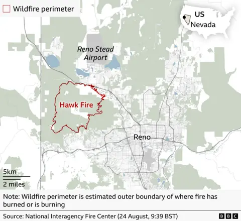 Map showing wildfire perimeter of the Hawk Fire west of Reno, Nevada. The area shows where the fire has burned and is currently burning in the Copperfield area near Silver Lake and Reno Stead Airport, with the city of Reno to the south-east. The perimeter covers the hills to the south of the Martin Luther King Jr Memorial Freeway towards Somersett. An inset map locates the fire within Nevada, in the western United States.