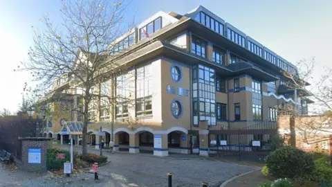 Google An external view of Horsham District Council's offices on a sunny day.