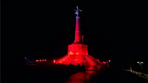 John Davies Aberystwyth war memorial lit up