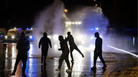 Charles McQuillan/Getty Images Police deployed water cannon for the first time in six years