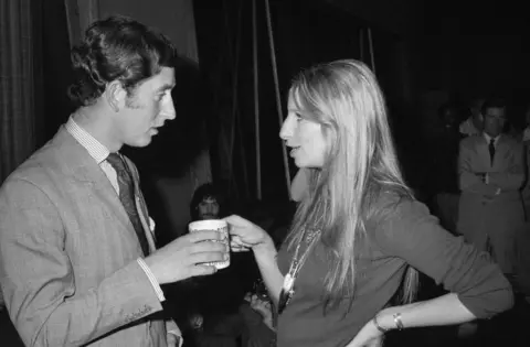 Getty Images Prince Charles and singer Barbra Streisand share a moment over tea at Warner Bros. studio on March 19, 1974