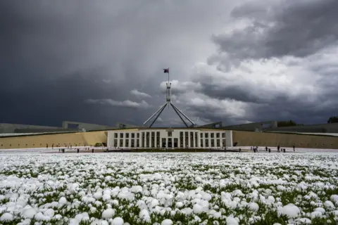 Getty Images Golf ball-sized hail is shown at Parliament House in Canberra on January 20