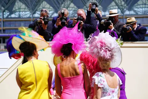 Adam Davy / PA Racegoers have their picture taken during day three of Royal Ascot at Ascot Racecourse. Thursday June 16, 2022.