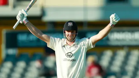 Cameron Green celebrates scoring a century for Gloucestershire against Kent on day two 