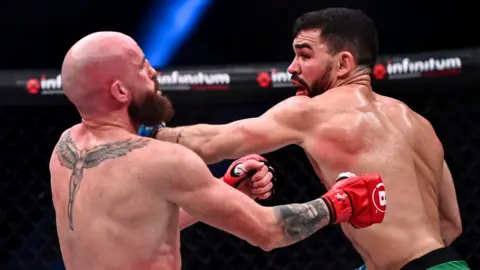 Peter Queally was stopped in the second round by Patricky 'Pitbull' Freire