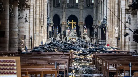 Reuters Interior view of Notre Dame after the fire