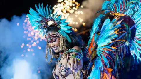 Courtesy of LizBliz Entertainment A woman wearing a elaborate costume at Trinidad's carnival