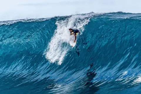 AFP South Africa's Jordy Smith competes during the Outerknown Tahiti Pro 2022, the Men's WSL Championship Tour, in Teahupo'o, French Polynesia.