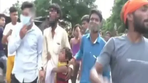 ANI A Muslim man was paraded through the streets as his crying daughter begged the mob to stop hitting him