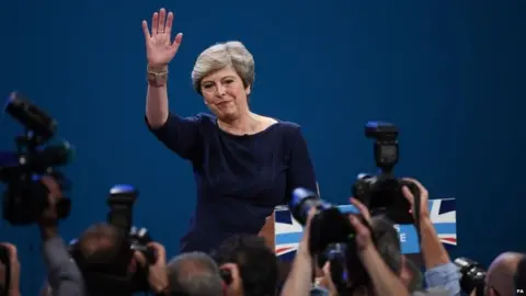 PA Theresa May at the end of her speech in Manchester