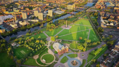 Getty Images An aerial view of Glasgow and the River Clyde, showing Glasgow Green at sunrise