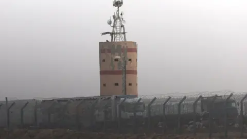 EPA File photo showing Egyptian aid lorries queuing at the Israeli-controlled Kerem Shalom crossing with Gaza (25 April 2024)