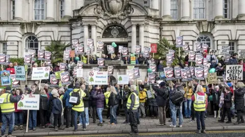 Yvonne Collier protesters march down road