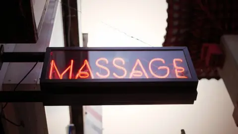 Getty Images Representational image of a massage parlour board