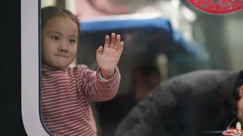 VCG A child on a train in China