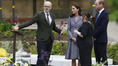 PA Media Architect Andy Thomson (left) with the Duke and Duchess of Cambridge