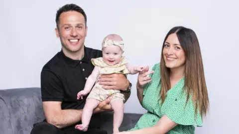 Nino Travagli Photography Paul Spence is holding daughter Gracie Spence