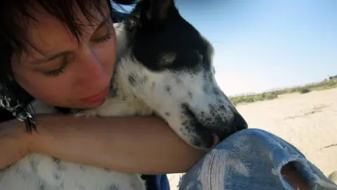 Laura Marston Laura Marston and her dog, Nicky