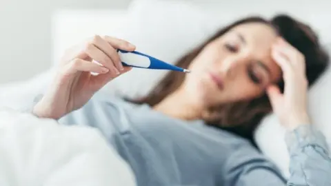 Getty Images Woman in bed