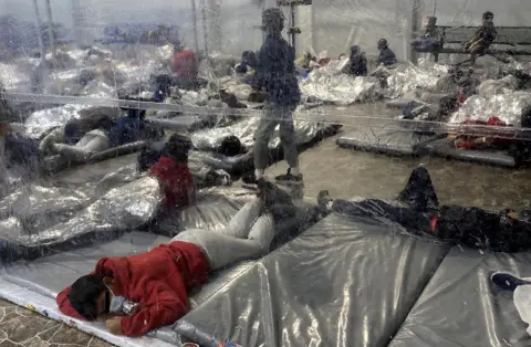 Reuters Migrants at the US Customs and Border Protection temporary processing centre in Donna, Texas, 22 March 2021