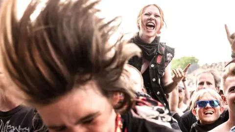 The audience reacts as Halestorm perform at Copenhell