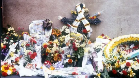 BBC Flowers outside the stadium after the fire