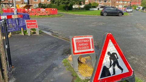 Jen Bateman/BBC Roadworks sign on Westlands Drive