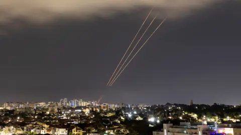 An anti-missile system operates after Iran launched drones and missiles towards Israel, as seen from Ashkelon, Israel April 14
