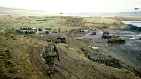 PA Media UK soldiers on 21 May, 1982 at San Carlos Bay using the area as a general landing point for supplies and equipment