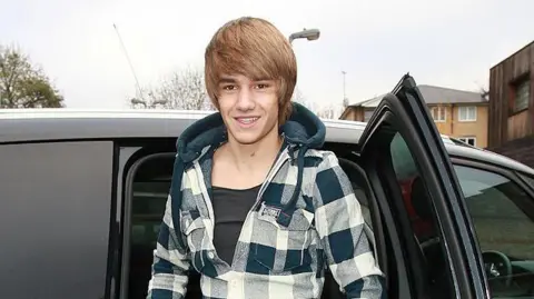 Getty Images Liam Payne loopt door een straat 