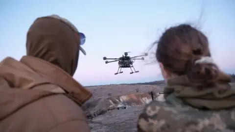 Ukrainian drone pilots from the 93rd Separate Mechanized Brigade 'Kholodnyi Yar' operate a 'Vampire' unmanned aerial system (UAS) during training.