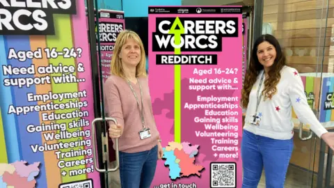 Two female workers at a careers hub