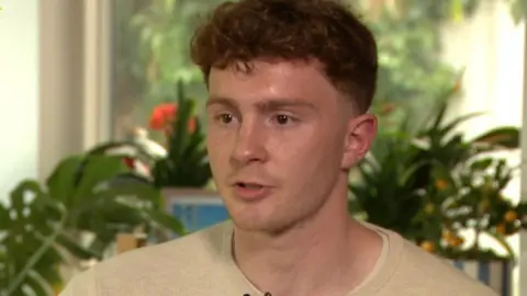 Man with reddish brown hair