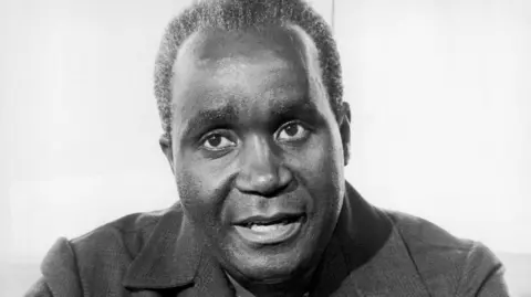 Gamma-Keystone via Getty Images A black and white portrait of Kenneth Kaunda